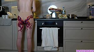 Naked housewife with octopus tattoo cooks dinner and ignores you