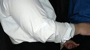 Slutty secretary in stockings jerks off her boss's big cock, indulging in kinky fetish play.