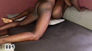 Ebony girl and her boss have a conversation in the movie house