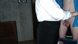 Slutty secretary in stockings jerks off her boss's big cock, indulging in kinky fetish play.