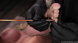 Huge tits on hairy milf, tied up in hogtie, suffering bizarre fetish pain.