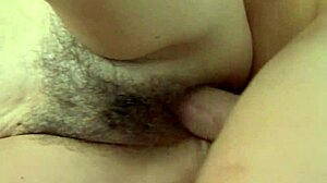 Hairy granny's pussy gets filled with young dick intensely