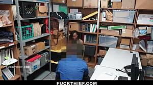 Black suspect bent over for punishment by officer in shop