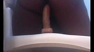 Solo Ebony Girl Rides Dildo on Chair in Ghetto