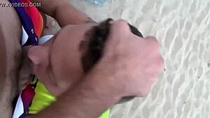 Public gay beach blowjob scene