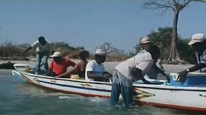 Kitu Gidwani without a shirt in a French film called Black