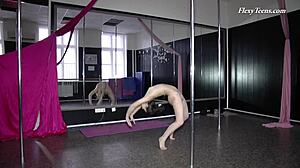 russian brunette gymnast stretches naked on the sofa in amateur moves