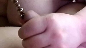 jayq's latest update shows him sounding his dick with steel balls while his wife fingers his peehole, blocking his cumshot