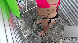 Hey, check out this homemade video of the latina mother-in-law in the beach dressing room, she's so hot in lingerie!