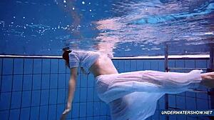 I’m stunned by Marketa’s amazing hairy underwater show at the pool.