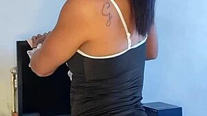 Tattooed brunette maid acts naughty in solo scene