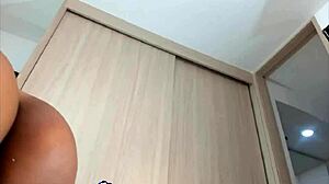 Busty Latina fingers her wet pussy