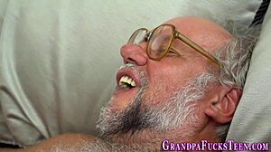 Busty teen gives sloppy blowjob to old man for cumshot