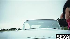 stunning lesbians with big tits lick pussy on retro road trip