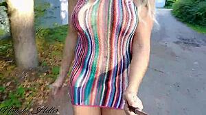 Young gay guy flashes big tits during naked suburban walks