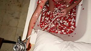 In the bath with rose petals, the couple engages in intense sex leading to creamy delight