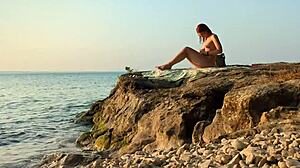 On a nudist beach, I asked a cute stranger to apply sunscreen on my natural tits.