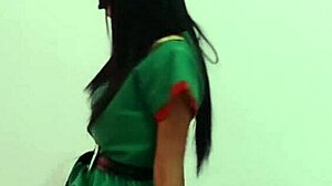 Celebrating christmas in costume, taking off clothes while dancing on the desk