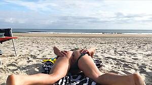 Milf toys with stranger's cock on beach, ends with cum in ass.