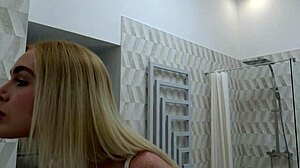 tattooed girlfriend changes clothes in bathroom