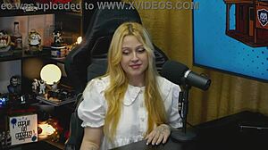 A branquinha from viamms poses on podcast table for show.