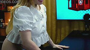 A branquinha from viamms poses on podcast table for show.