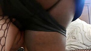 Slutty white PAWG in fishnet and cat mask sucks and fucks big black cock bareback.