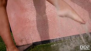 Big tits model lucy li fingers to orgasm under waterfall