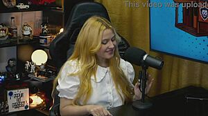 A branquinha from viamms poses on podcast table for show.