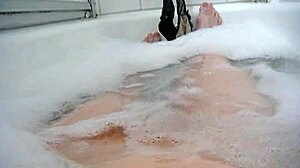 Annie's big tits fingered in monster bath bubbles