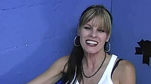Busty cougar anjelica sucks that monster bbc at the gloryhole.