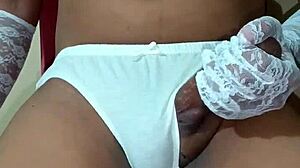 Thai ladyboy shemale seductively poses in erotic white panties and bra