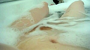 Annie's big tits fingered in monster bath bubbles