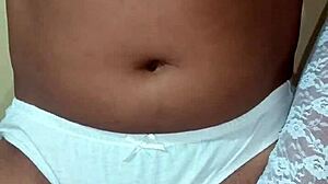 Thai ladyboy shemale seductively poses in erotic white panties and bra