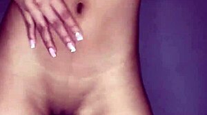 Hot amateur babe bent over naked shows pretty pussy and small tits