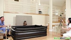 brunette masseuse gives naked nuru massage.