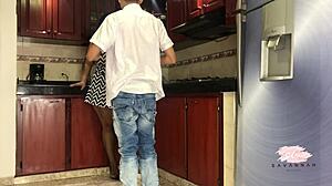 Savannah Watson sucks big tits in kitchen