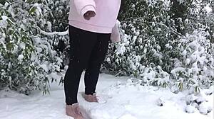 An older couple enjoys a snowy outdoor adventure together