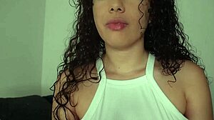 Beautiful homemade video of a curly-haired girl enjoying solo pleasure with big natural tits