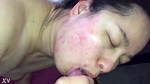 hey babe, watch this asian milf fluffing my cock on webcam