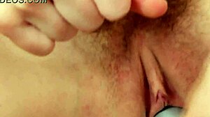 Why does this brunette milf mom finger her shaved pussy so wildly in lingerie?