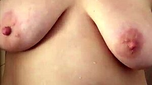 Curvy BBW mama tantalizes in shower, washing hair and shaving her natural big tits