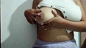 milf massages her huge natural tits with real pleasure at home