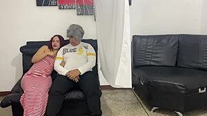 Doctor examines teen girl beside stepfather