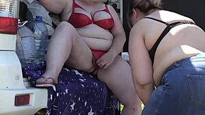 mature women behind the scenes outdoors. a voyeur with hidden camera watches in the park