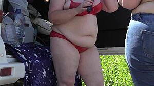 mature women behind the scenes outdoors. a voyeur with hidden camera watches in the park