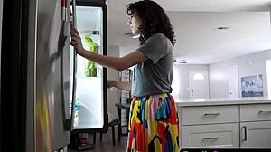 Stepdaughter kneels to blow her stepdad in a sneaky family moment.