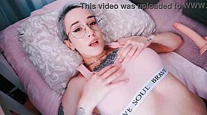 The fuckmachine tittyfucks my tattooed teen tits with dildo