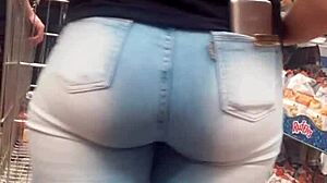 spying on the hot brunette ass in jeans at the shop