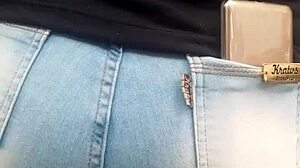 spying on the hot brunette ass in jeans at the shop